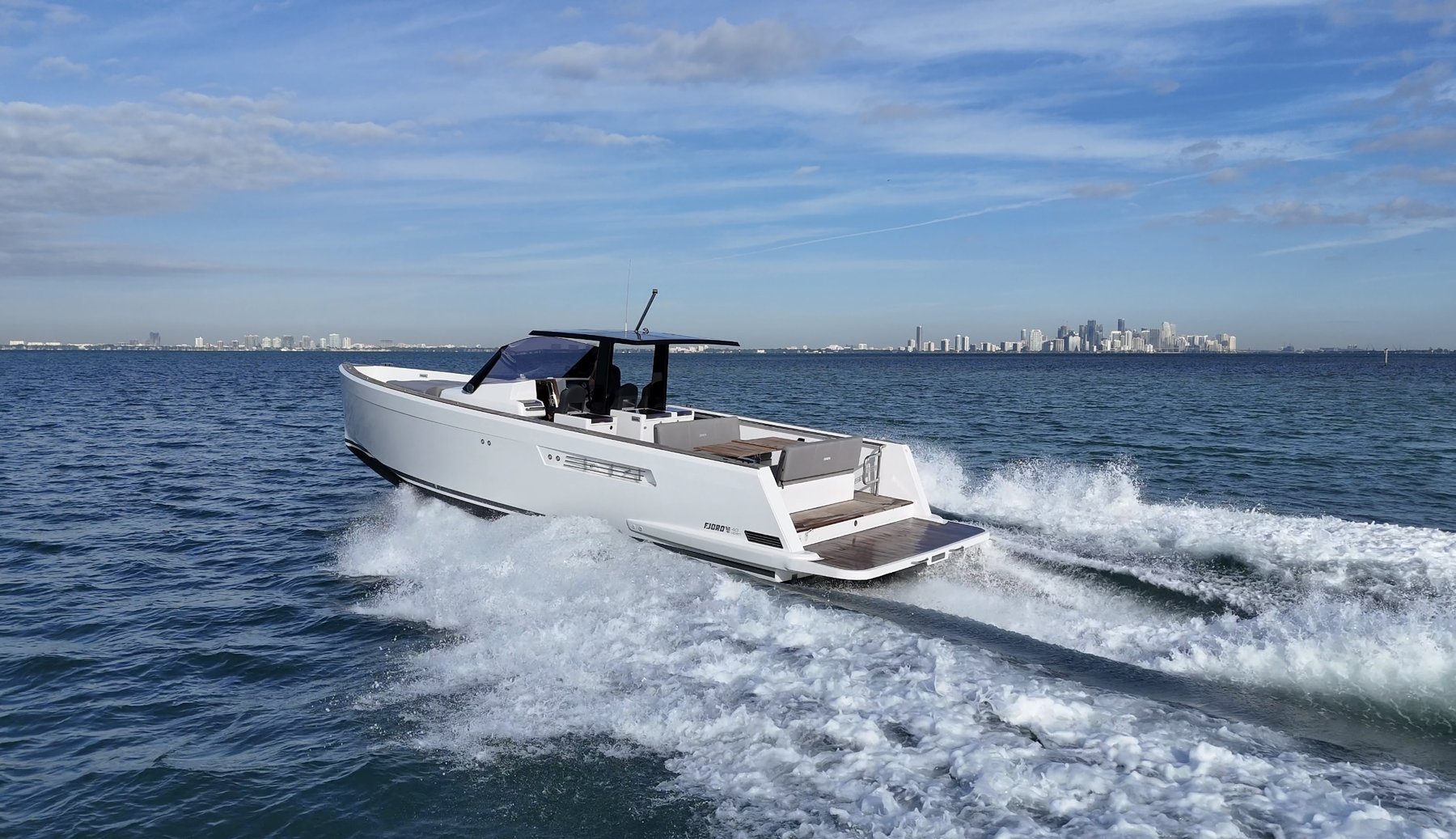 Bow-quarter view underway with Miami skyline